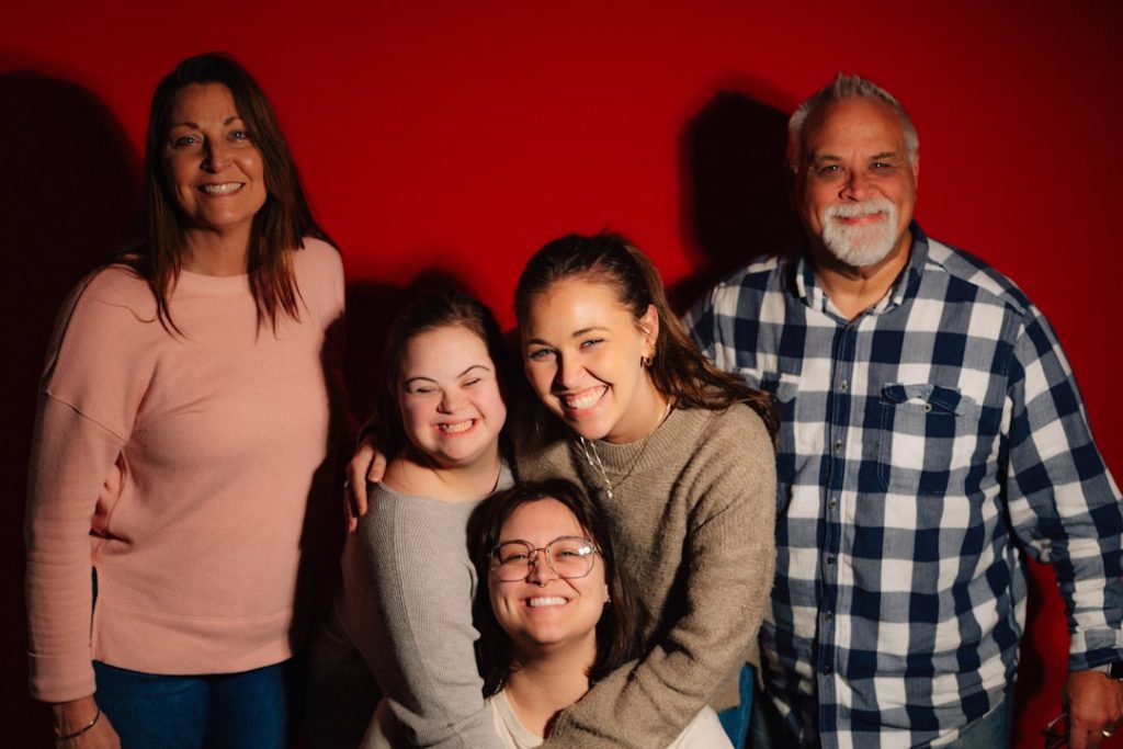 A happy family poses for a photo